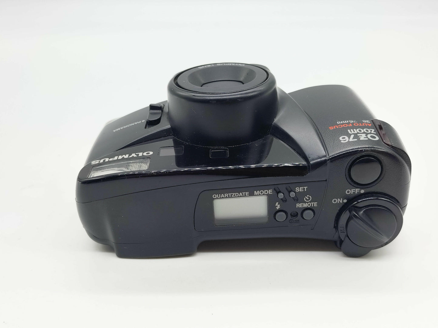 Olympus OZ-76 point-and-shoot film camera.