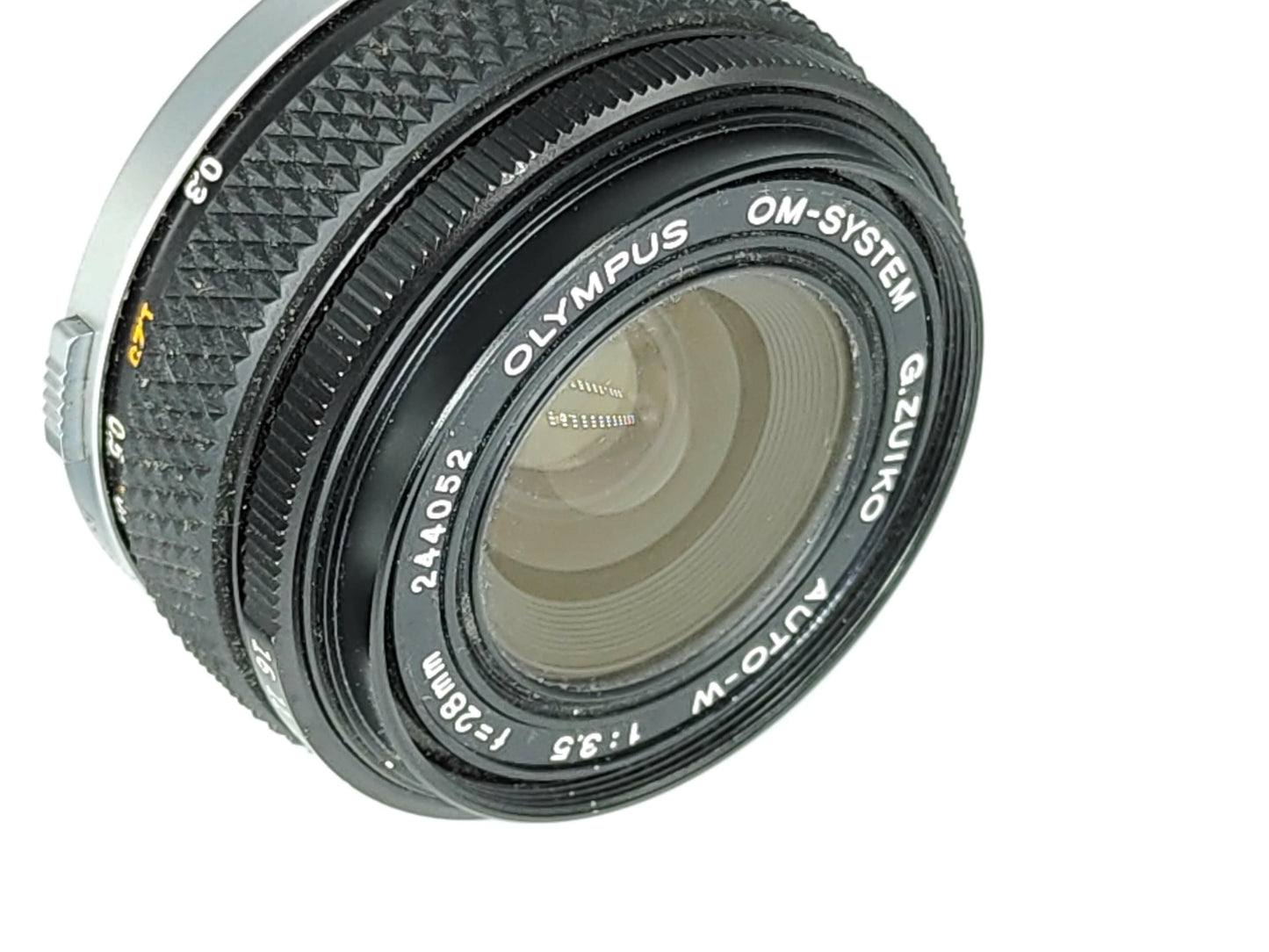 Olympus 28mm f/3.5 wide-angle lens.