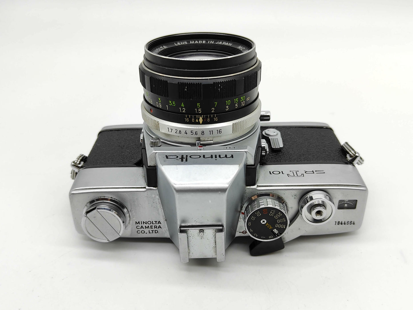 Minolta SRT-101 film camera with 50mm lens.