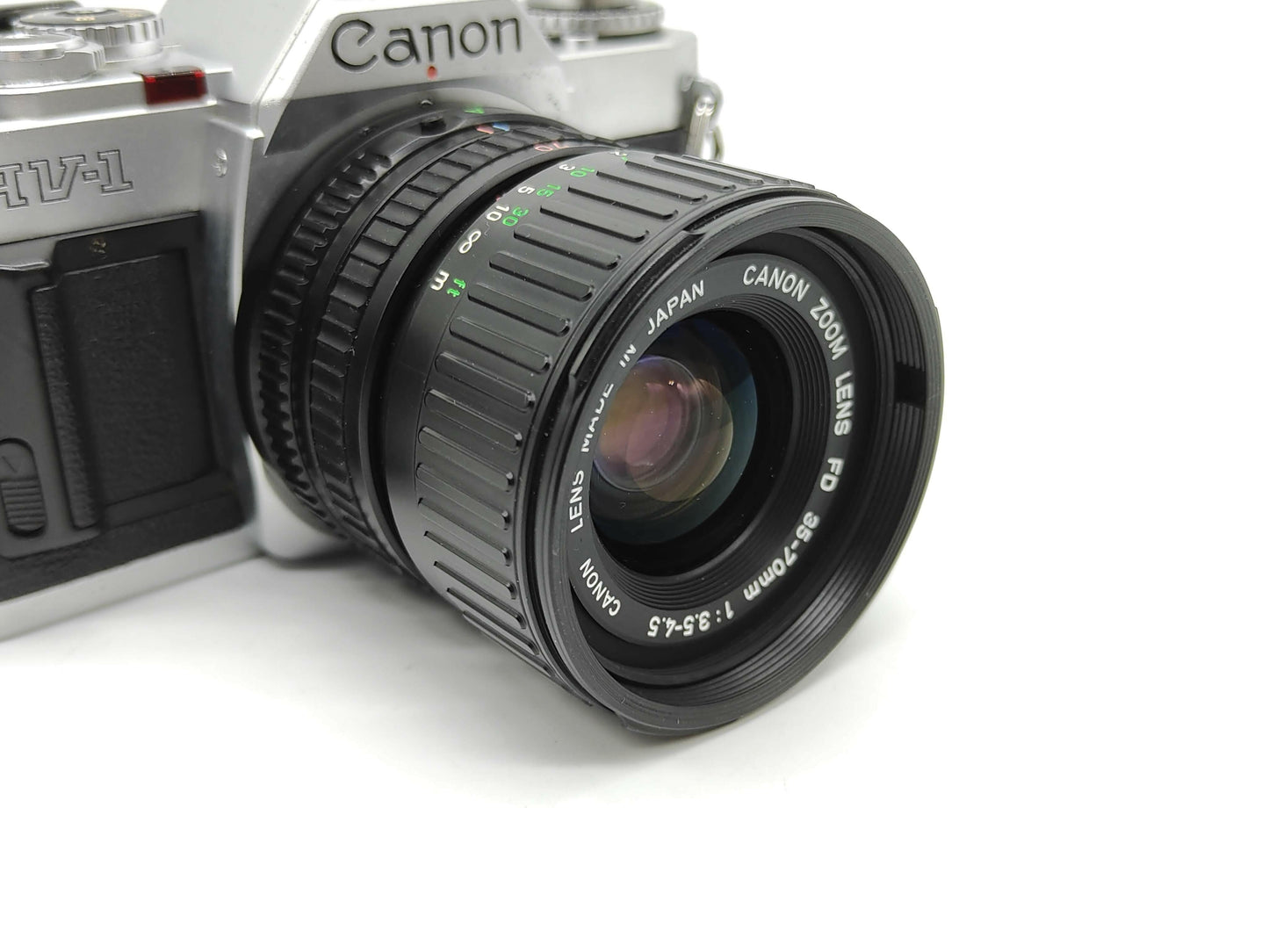 Canon AV-1 SLR camera - silver or black.