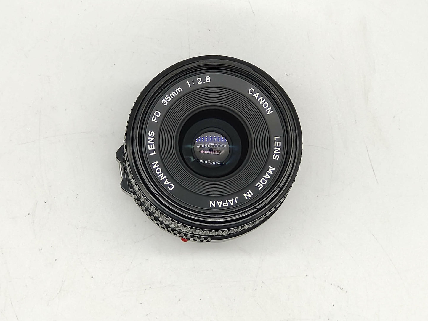 Canon 35mm f/2.8 New FD wide-angle lens.