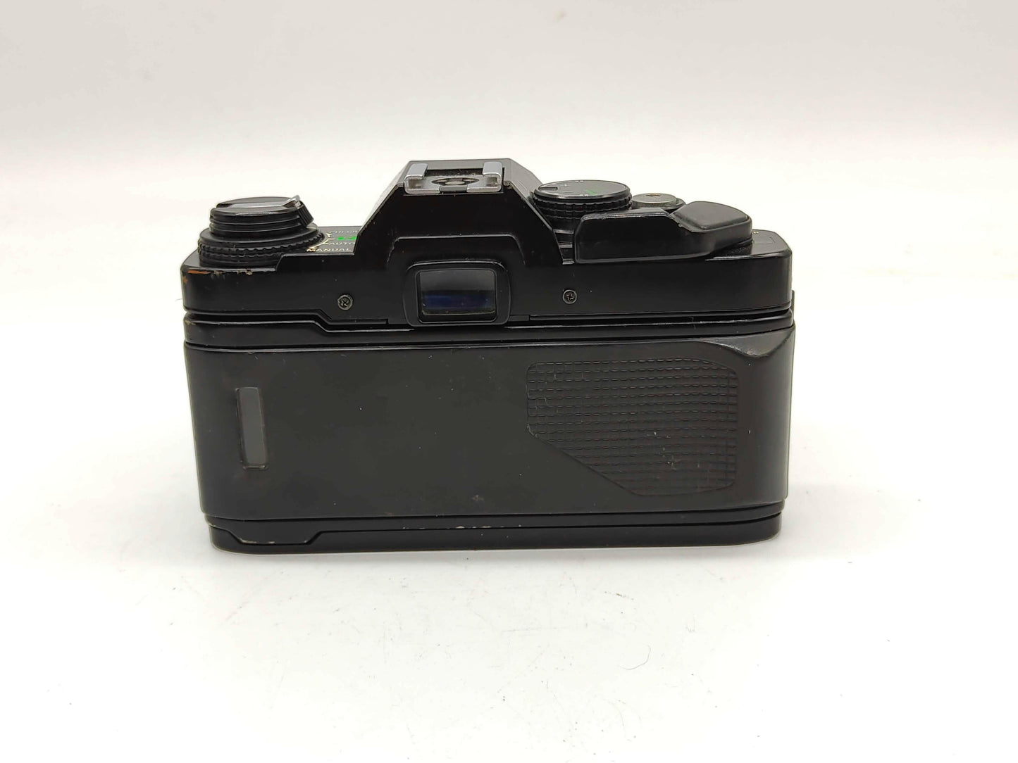 Olympus OM-40 with 50mm f/1.8 lens.