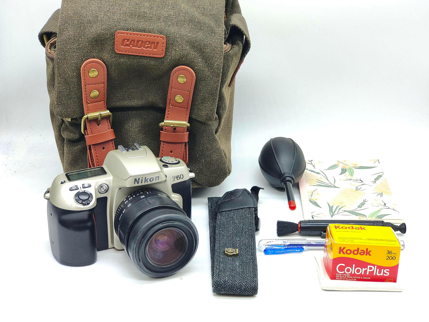 Nikon F65 + zoom lens SLR film camera gift set.