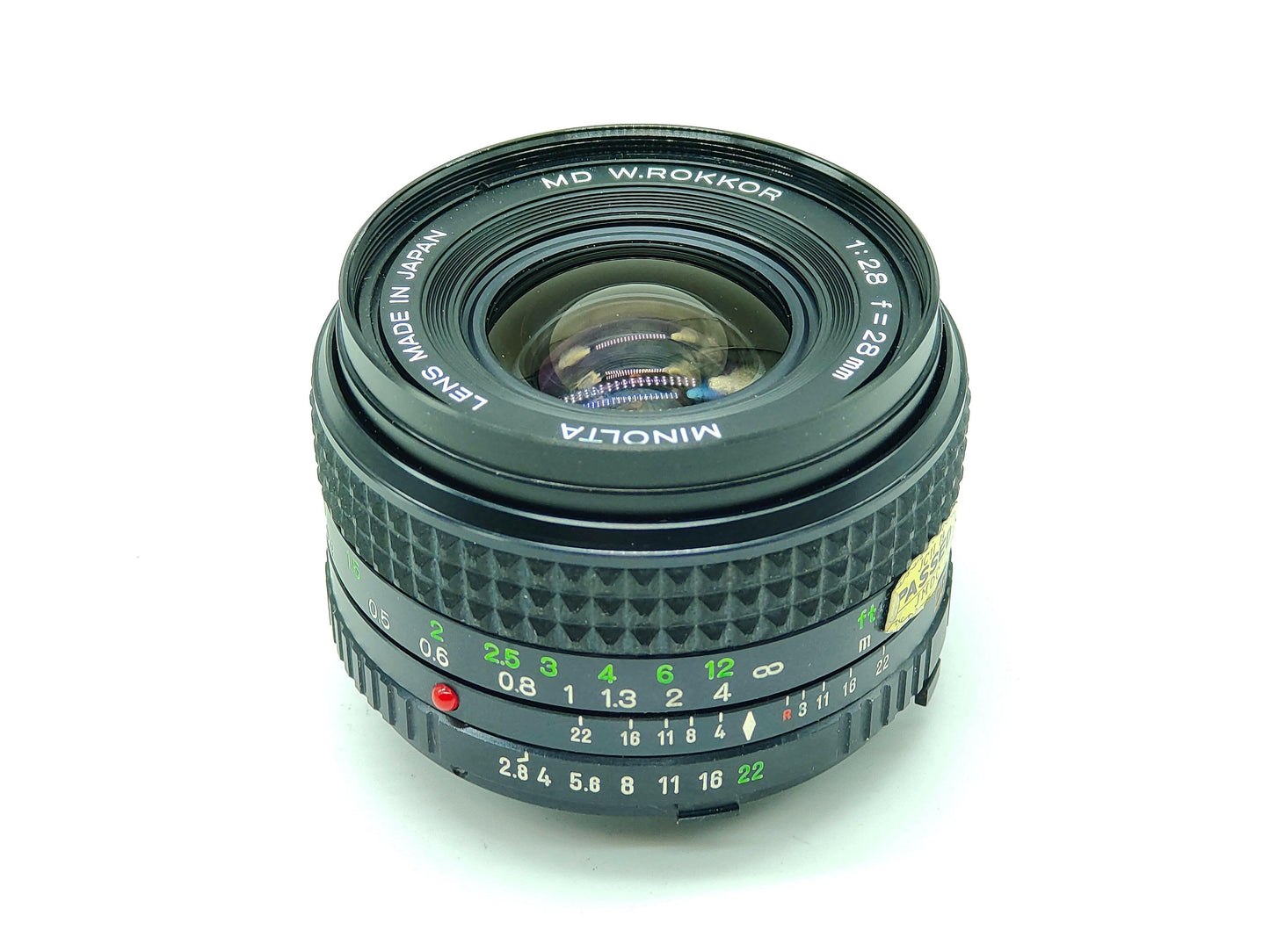 Minolta 28mm f/2.8 wide-angle lens.
