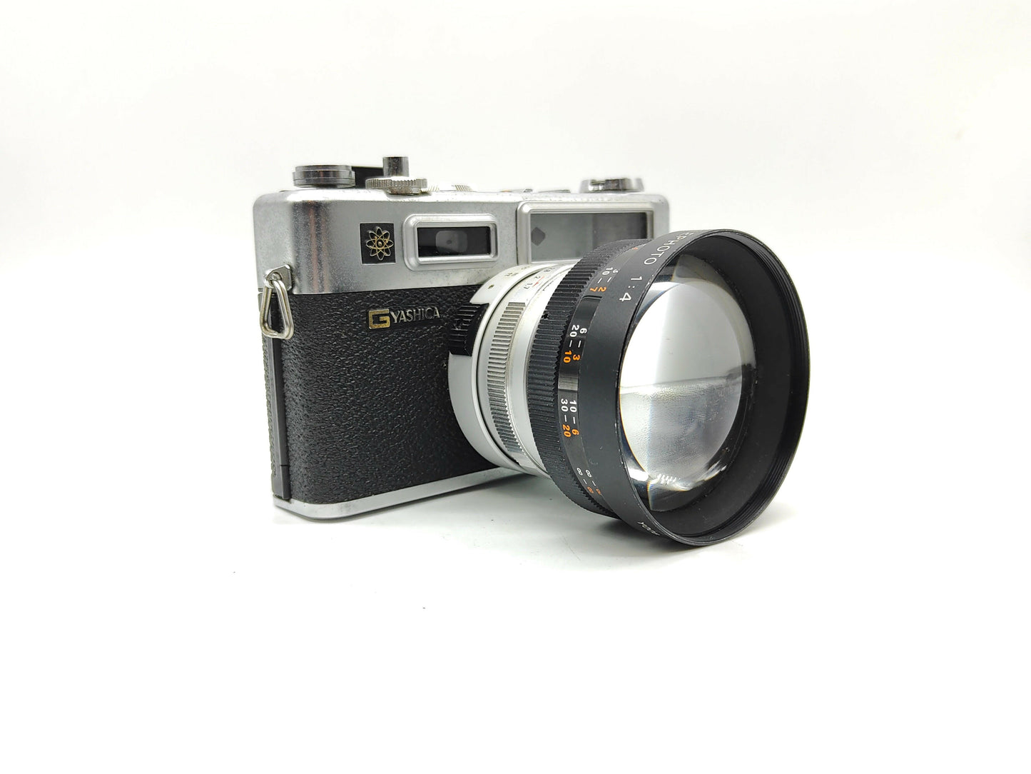 Yashica telephoto lens converter for Electro 35 cameras.