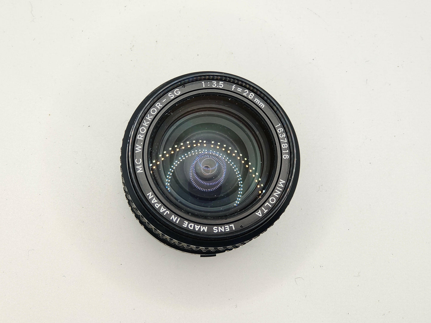 Minolta 28mm f/3.5 wide-angle lens.