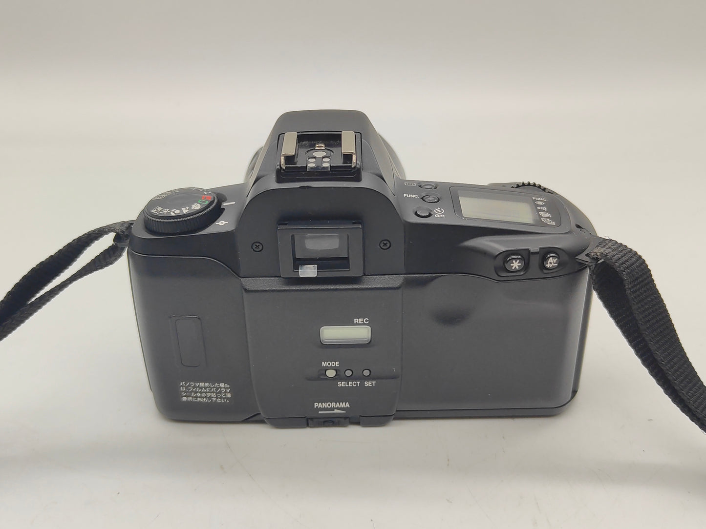 Canon EOS Kiss camera with 35-80mm zoom lens