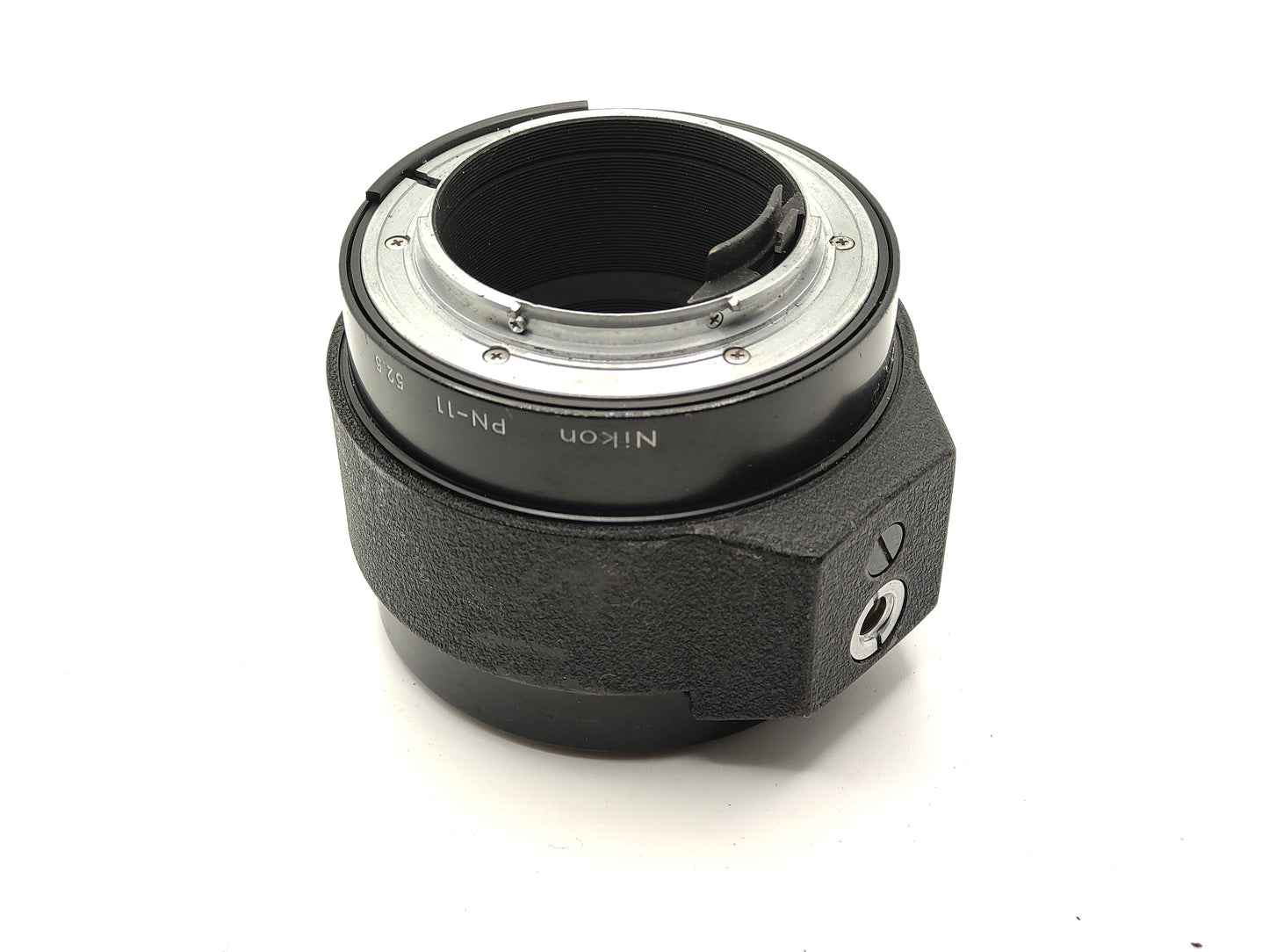 Nikon PN-11 52.5mm Extension Tube (Nikon F mount) with tripod socket.