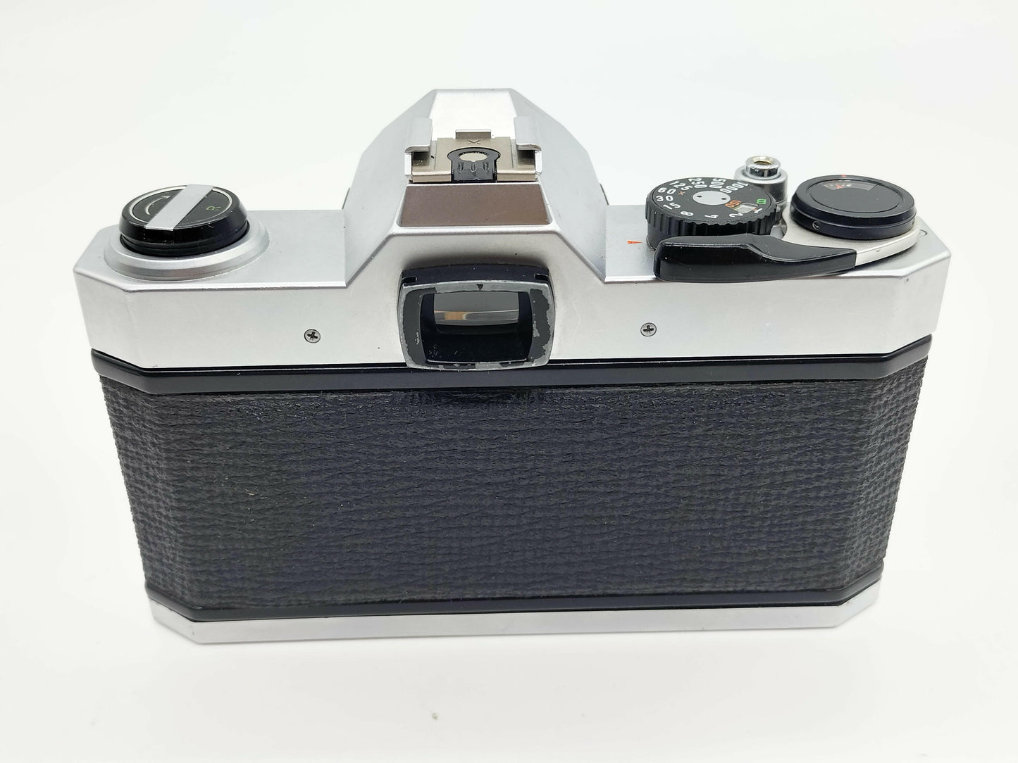Pentax K1000 SLR film camera with 50mm lens.