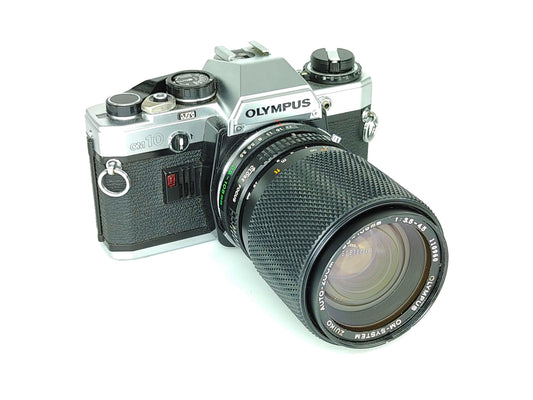 Olympus OM-10 with 35-105mm zoom lens.