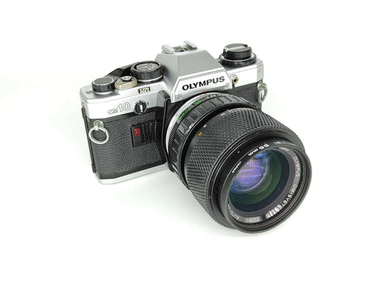 Olympus OM-10 with 35-70mm Olympus Zoom lens.