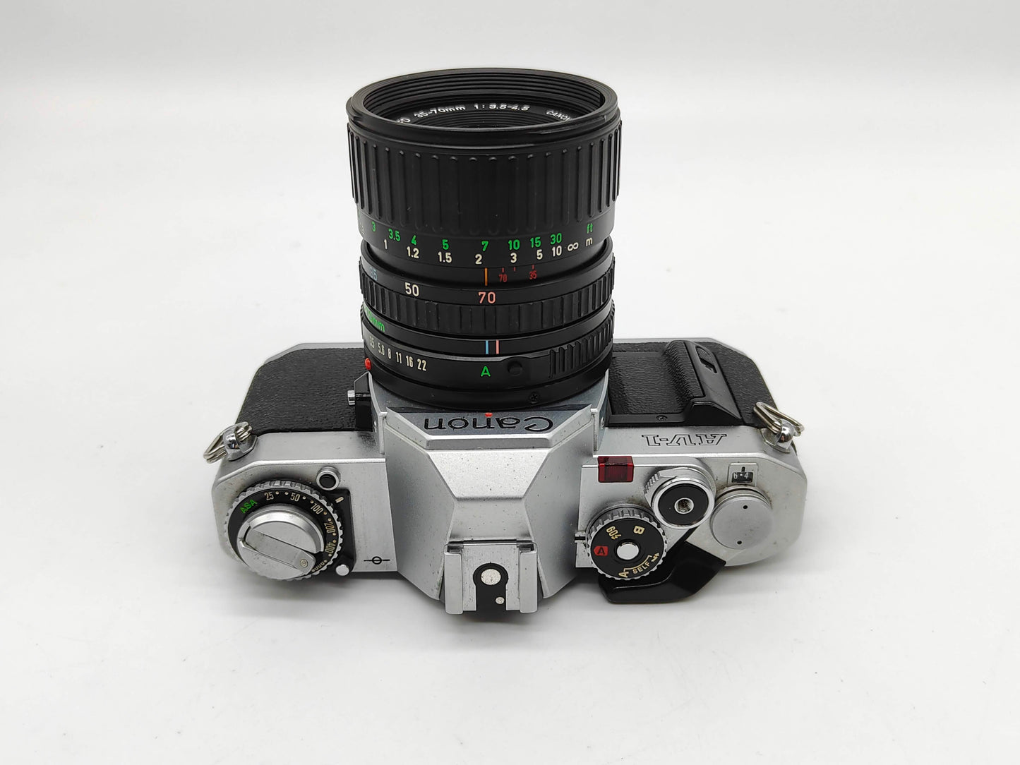 Canon AV-1 SLR camera with 35-70mm zoom lens