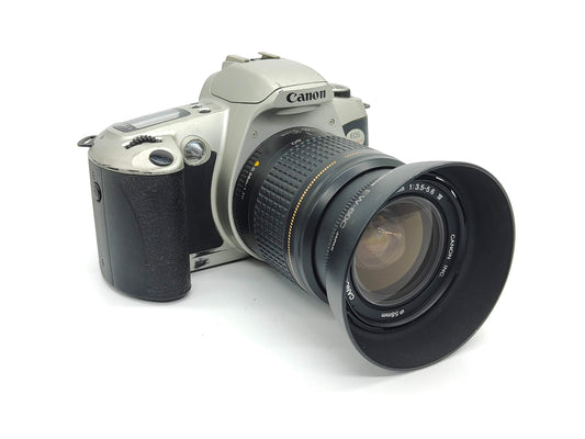 Canon EOS Kiss camera with zoom lens