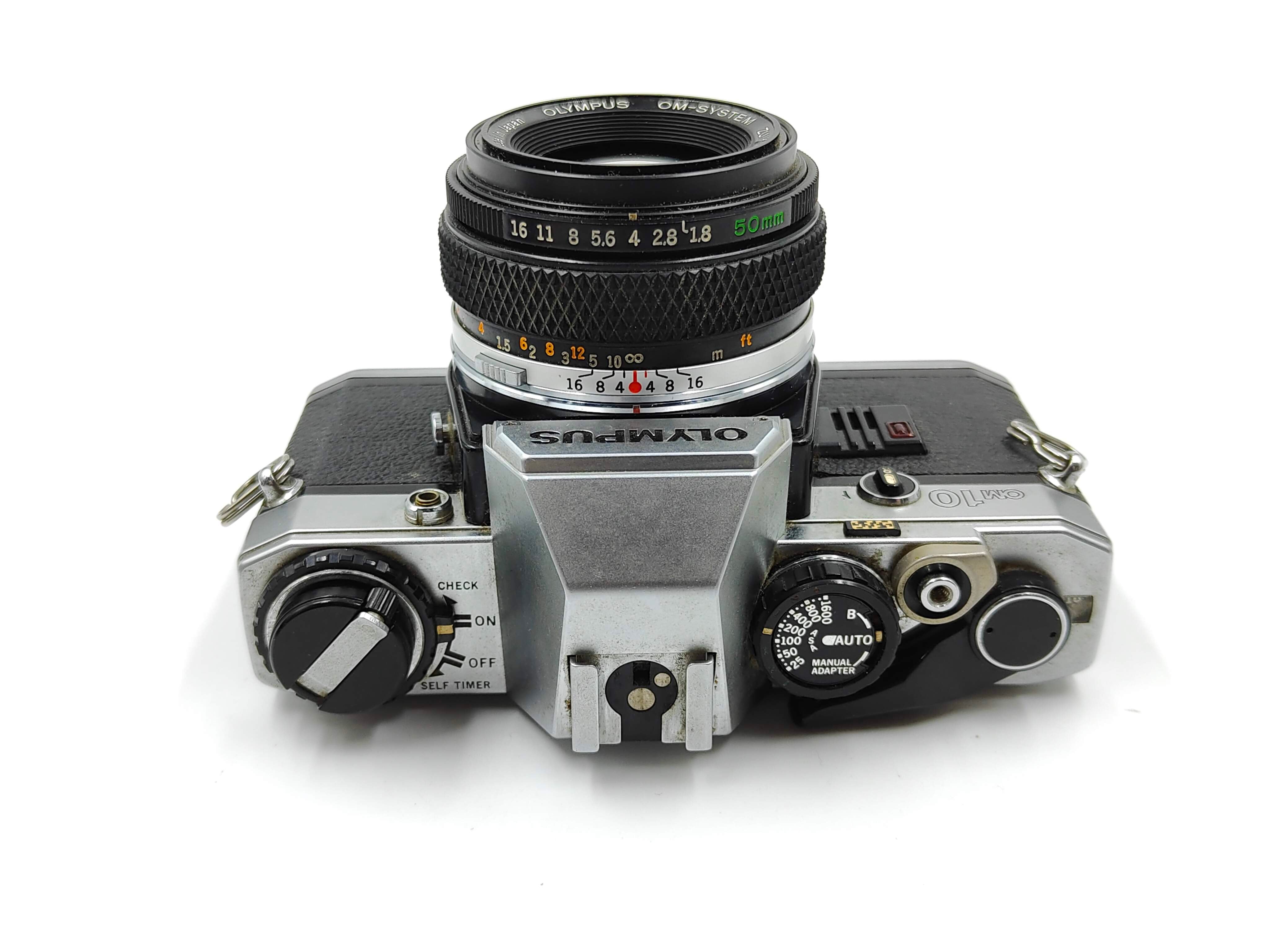 Olympus OM-10 (silver) with 50mm f/1.8 lens – Classic Cameras AU