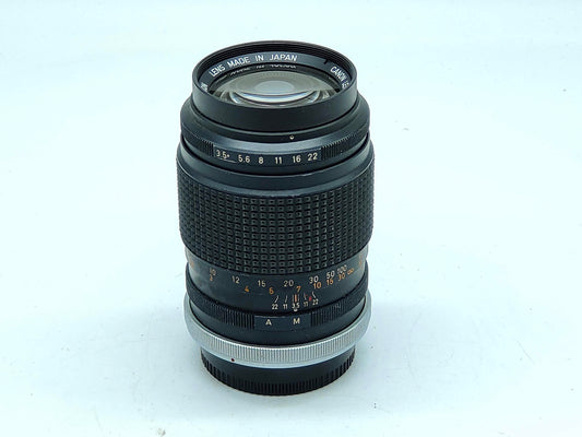 Canon lens: 135mm f/3.5 FL portrait / medium telephoto lens for early model Canon SLRs