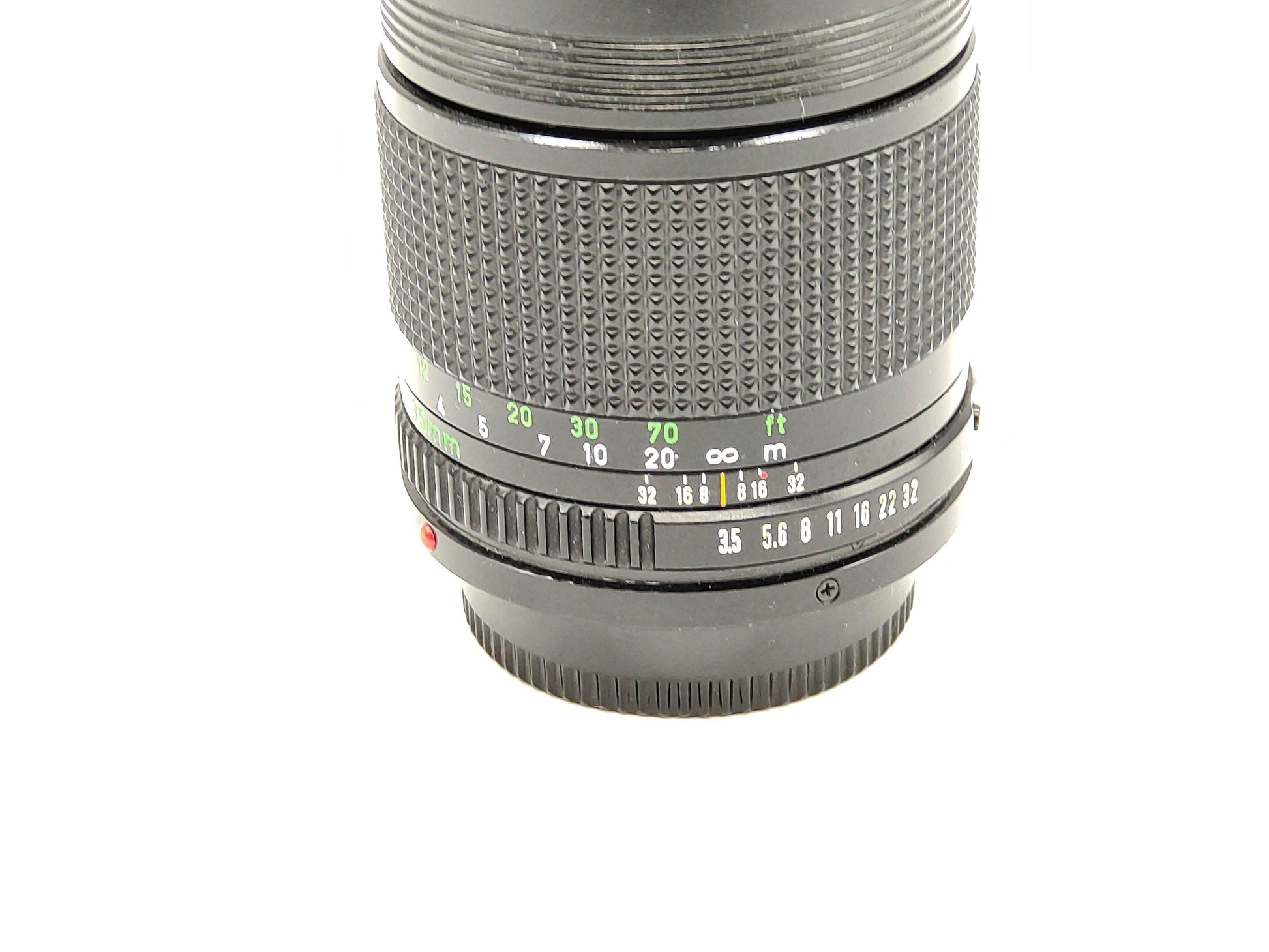 Canon lens: 135mm New FD portrait medium telephoto lens