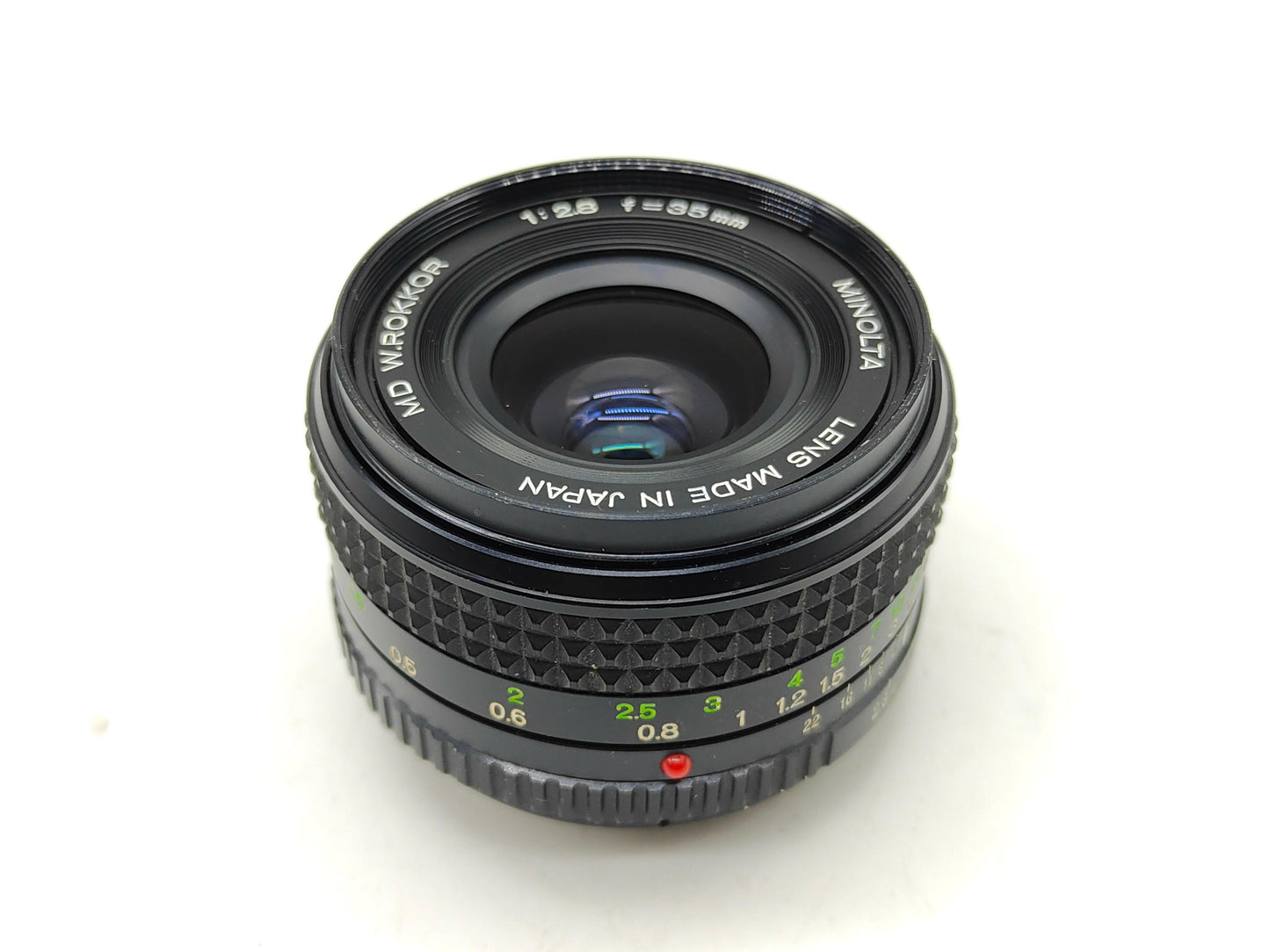 Minolta 35mm f/2.8 wide-angle lens.