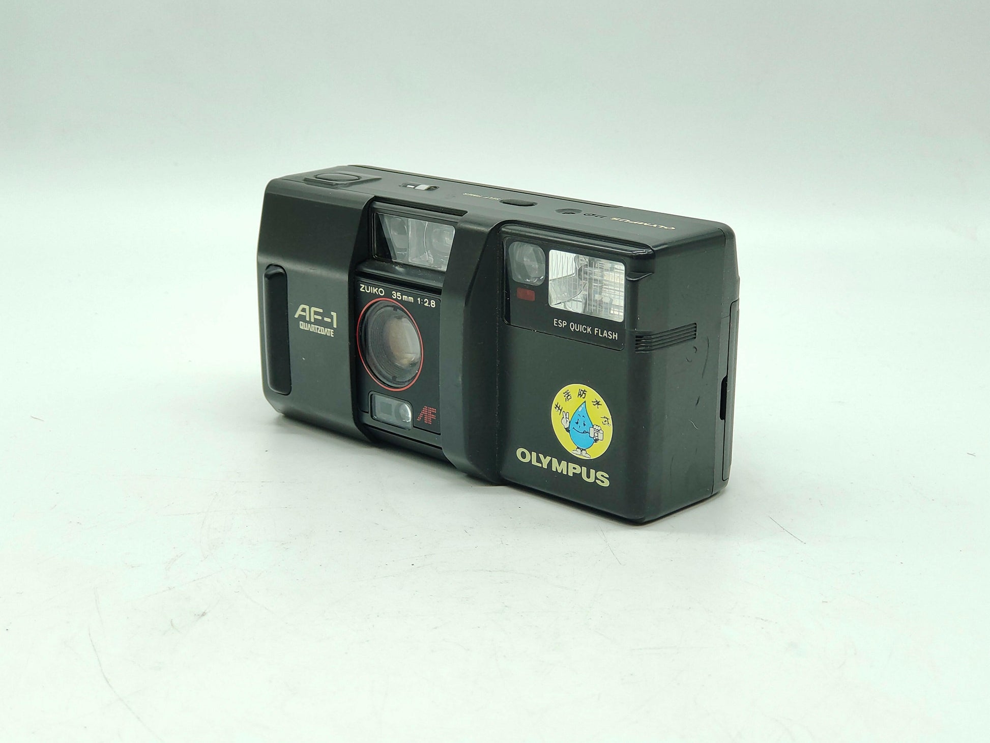 Olympus AF-1 weatherproof point-and-shoot camera.