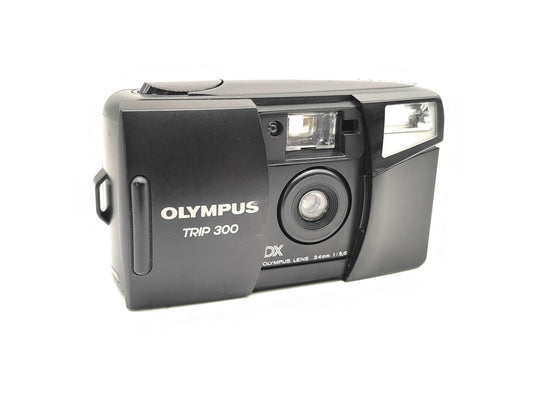 Olympus Trip 300 film camera with flash.