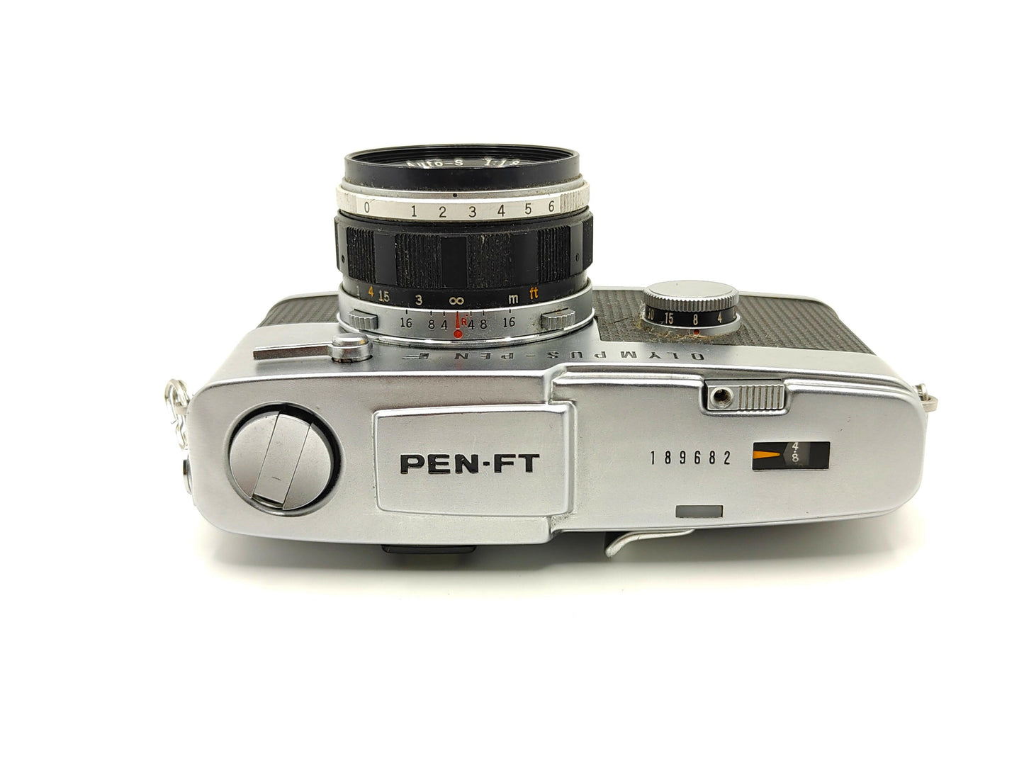 Olympus Pen-FT half-frame SLR camera.