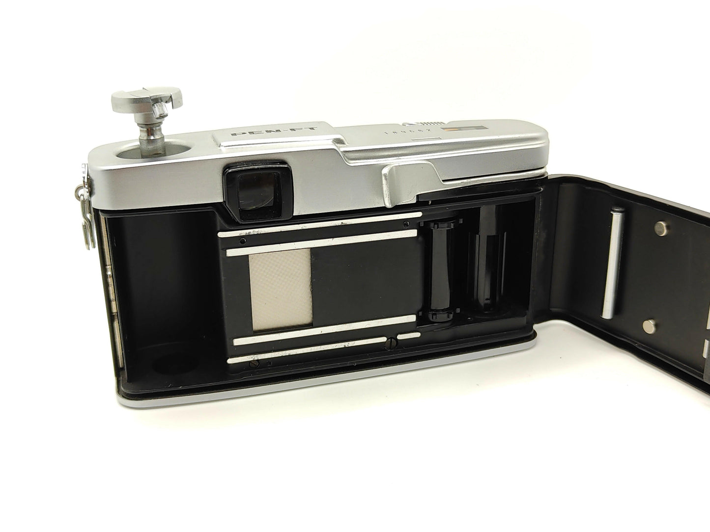 Olympus Pen-FT half-frame SLR camera.