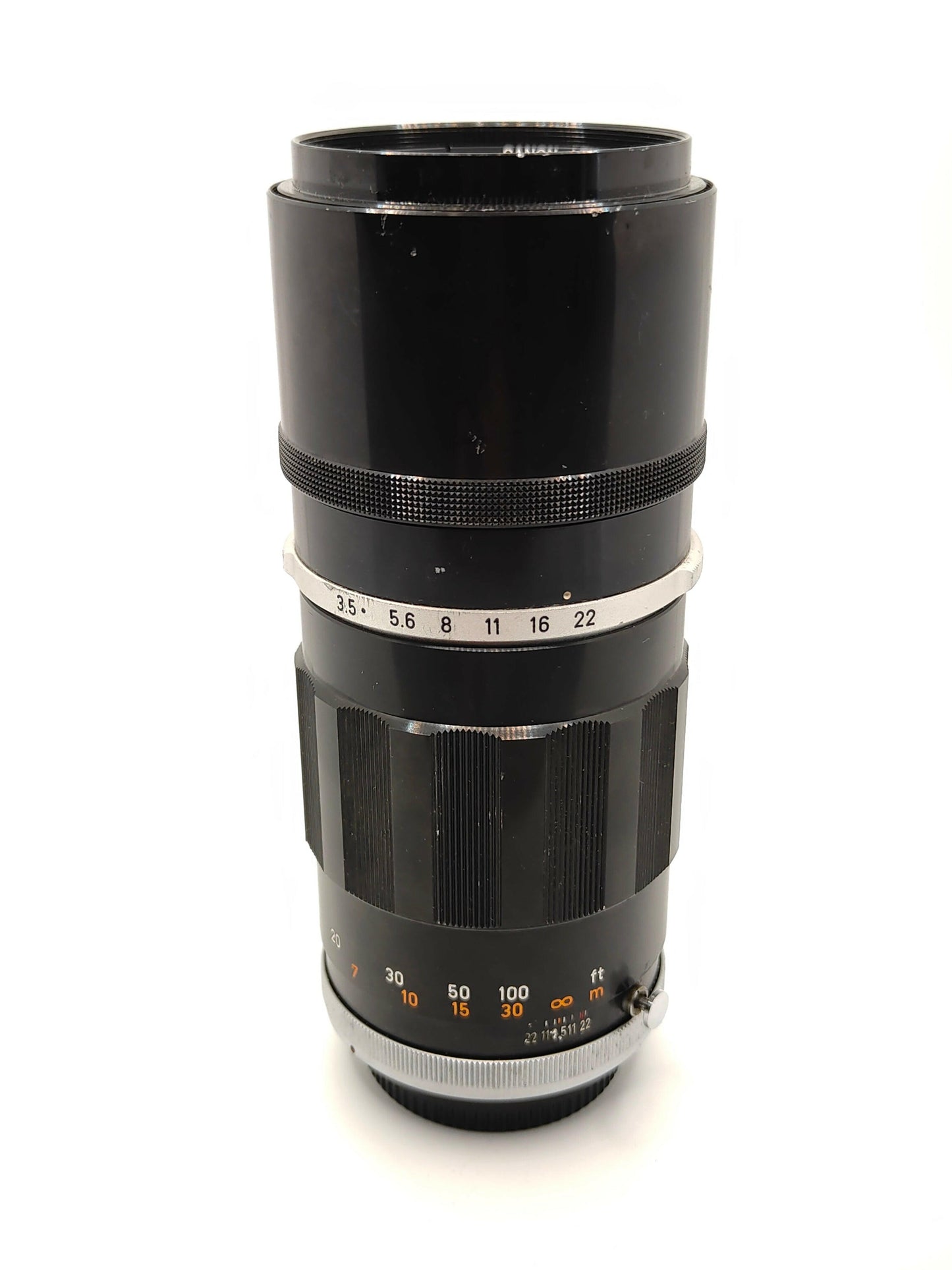 Canon lens: 200mm f/3.5 FL telephoto lens for early model Canon SLRs.