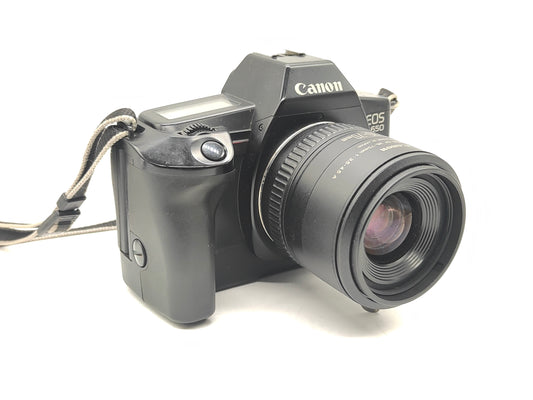 Canon EOS-650 SLR film camera + 35-70mm zoom lens.