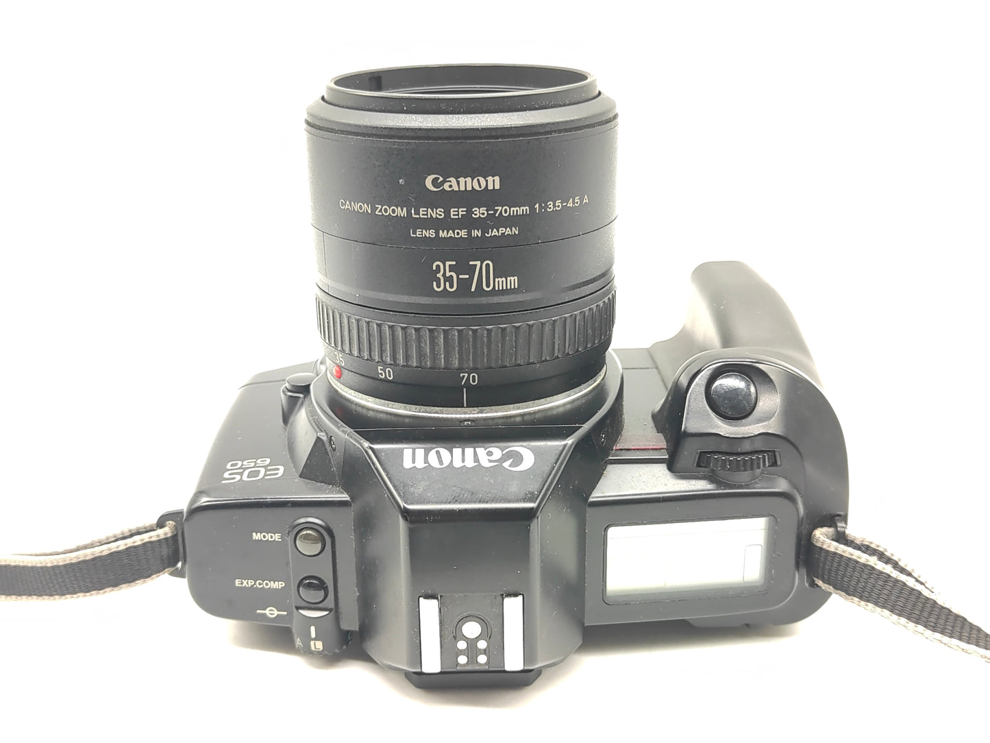 Canon EOS-650 SLR film camera + 35-70mm zoom lens.