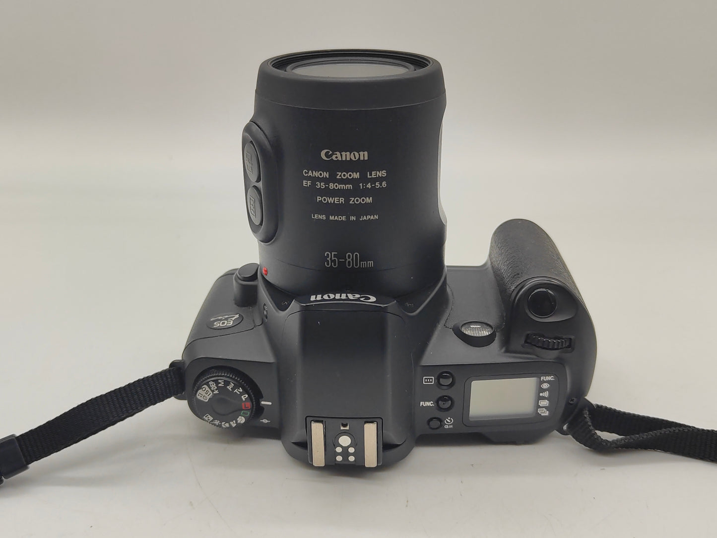 Canon EOS Kiss camera with 35-80mm zoom lens