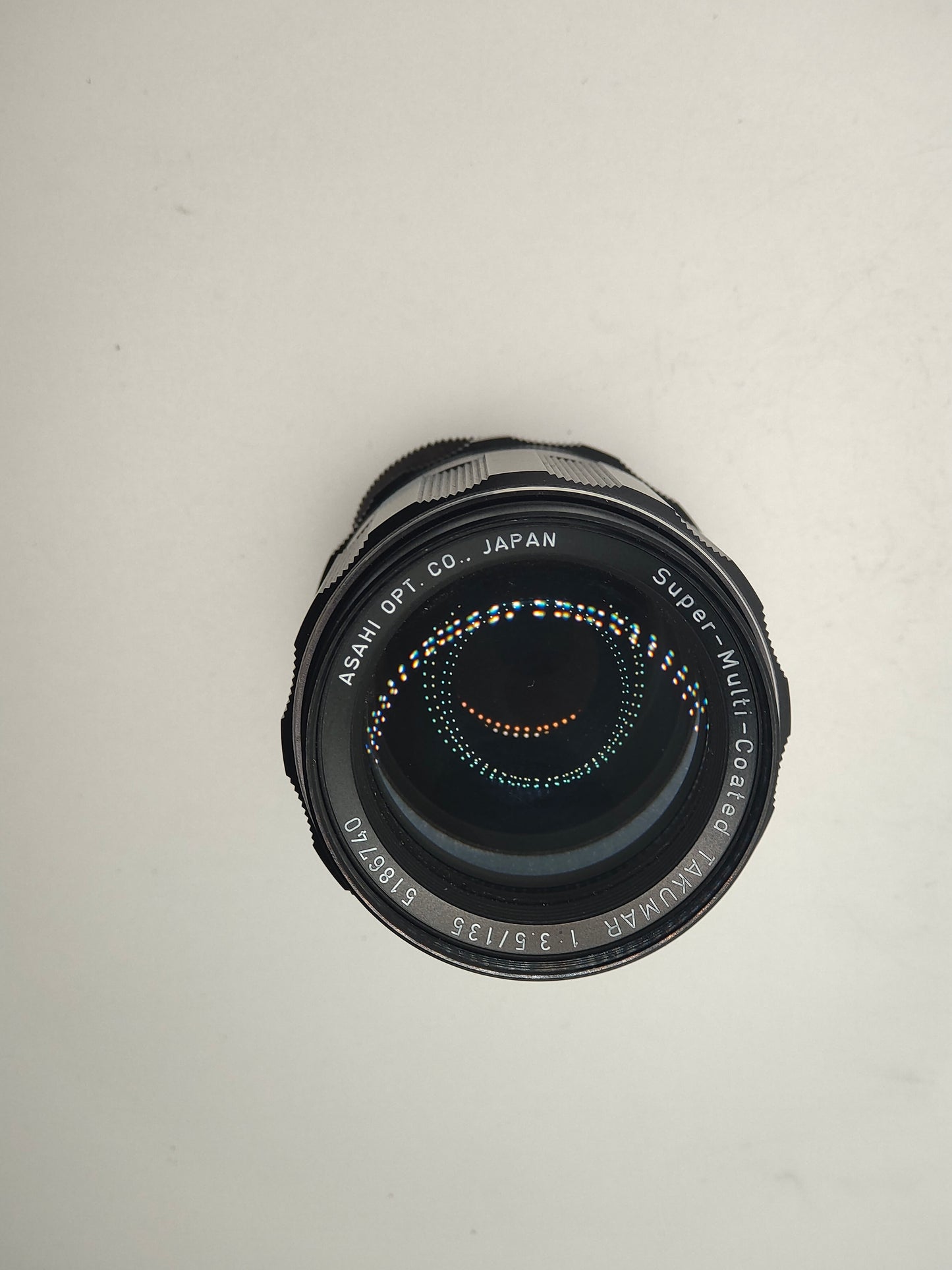 Pentax Super-Multi-Coated Takumar 135mm f/3.5 M42 telephoto lens.