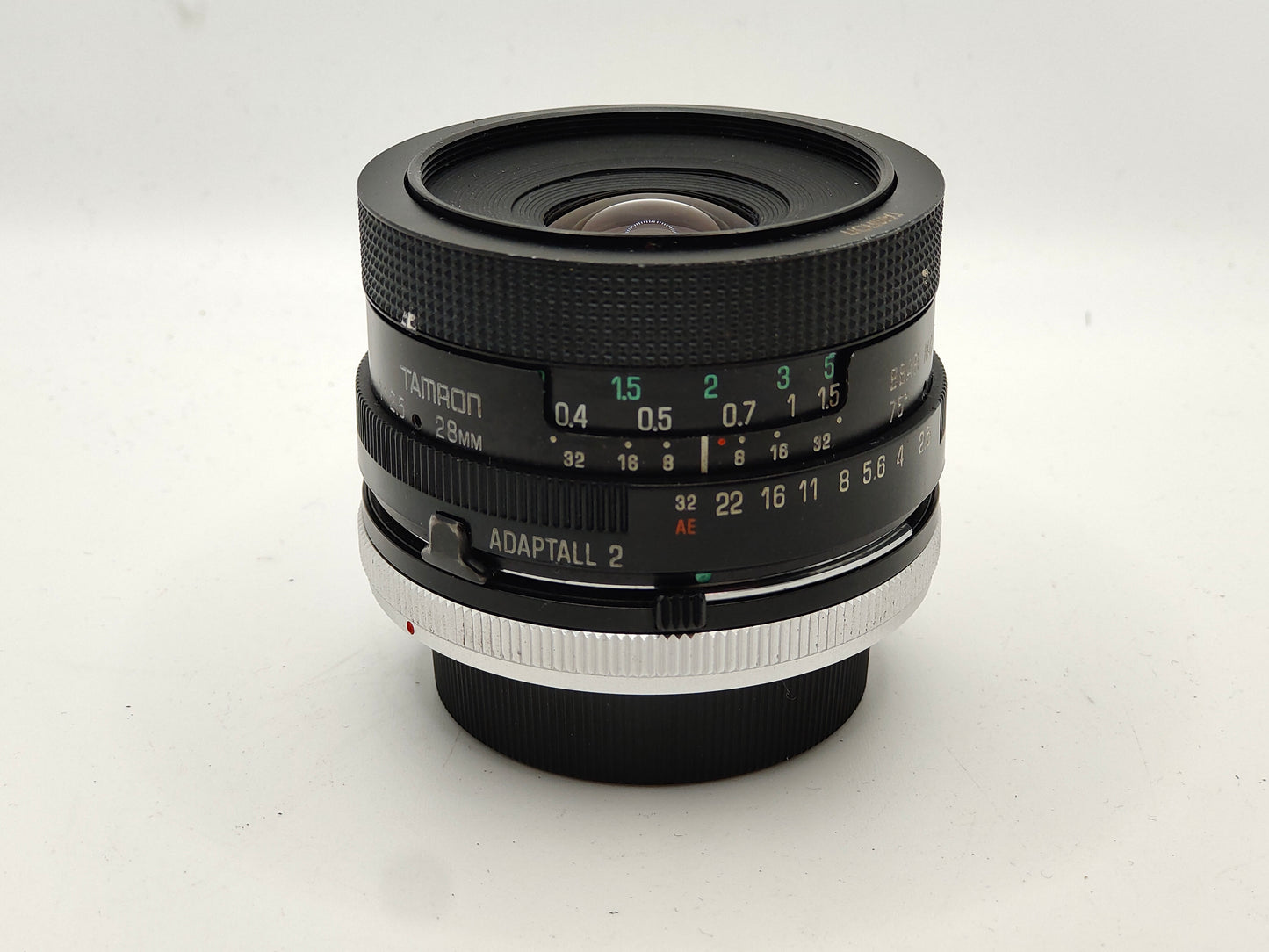 Tamron 28mm f/2.5 wide-angle lens with Canon FD mount.