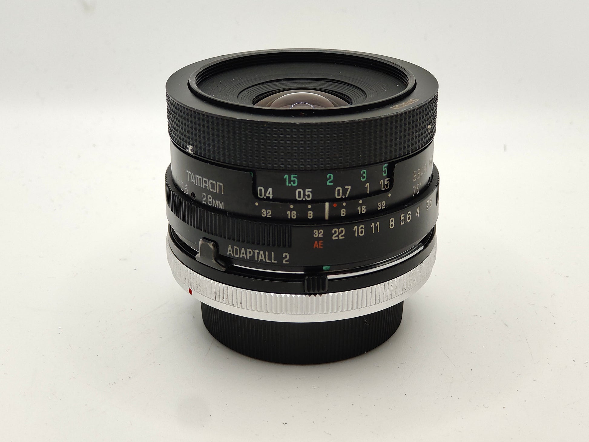 Tamron 28mm f/2.5 wide-angle lens with Canon FD mount.