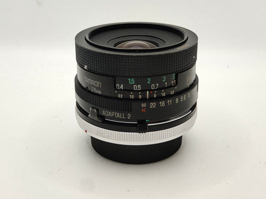 Tamron 28mm f/2.5 wide-angle lens with Canon FD mount.