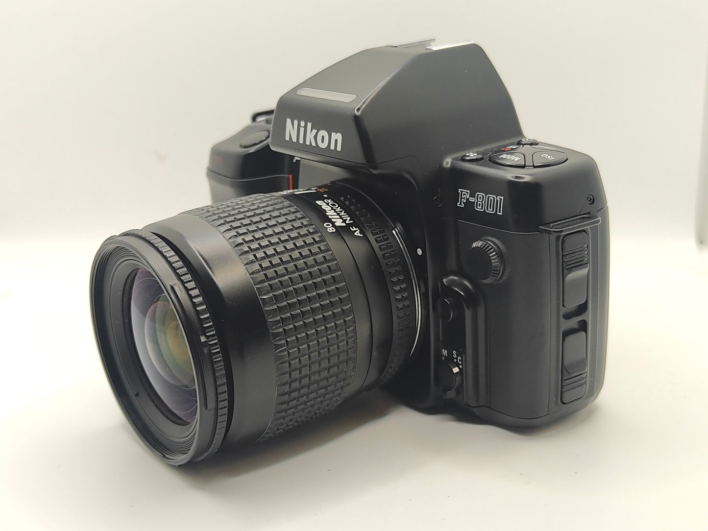 Nikon F-801 + 28-80mm zoom lens