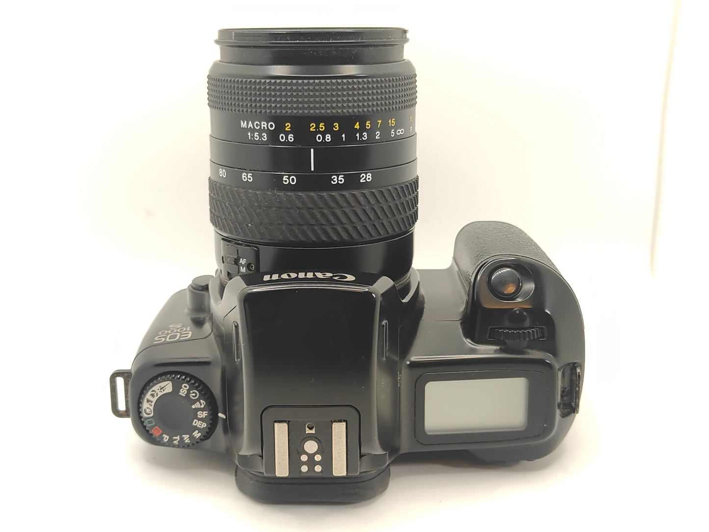 Canon EOS-1000 Quartz Date SLR film camera with zoom lens