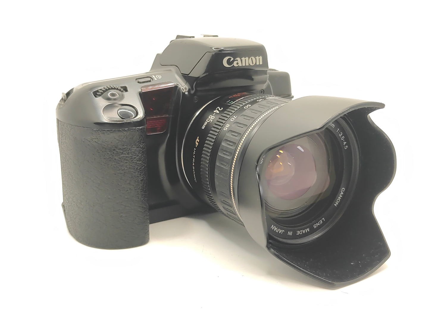 Canon EOS-10 SLR film camera and 24-85mm zoom lens.