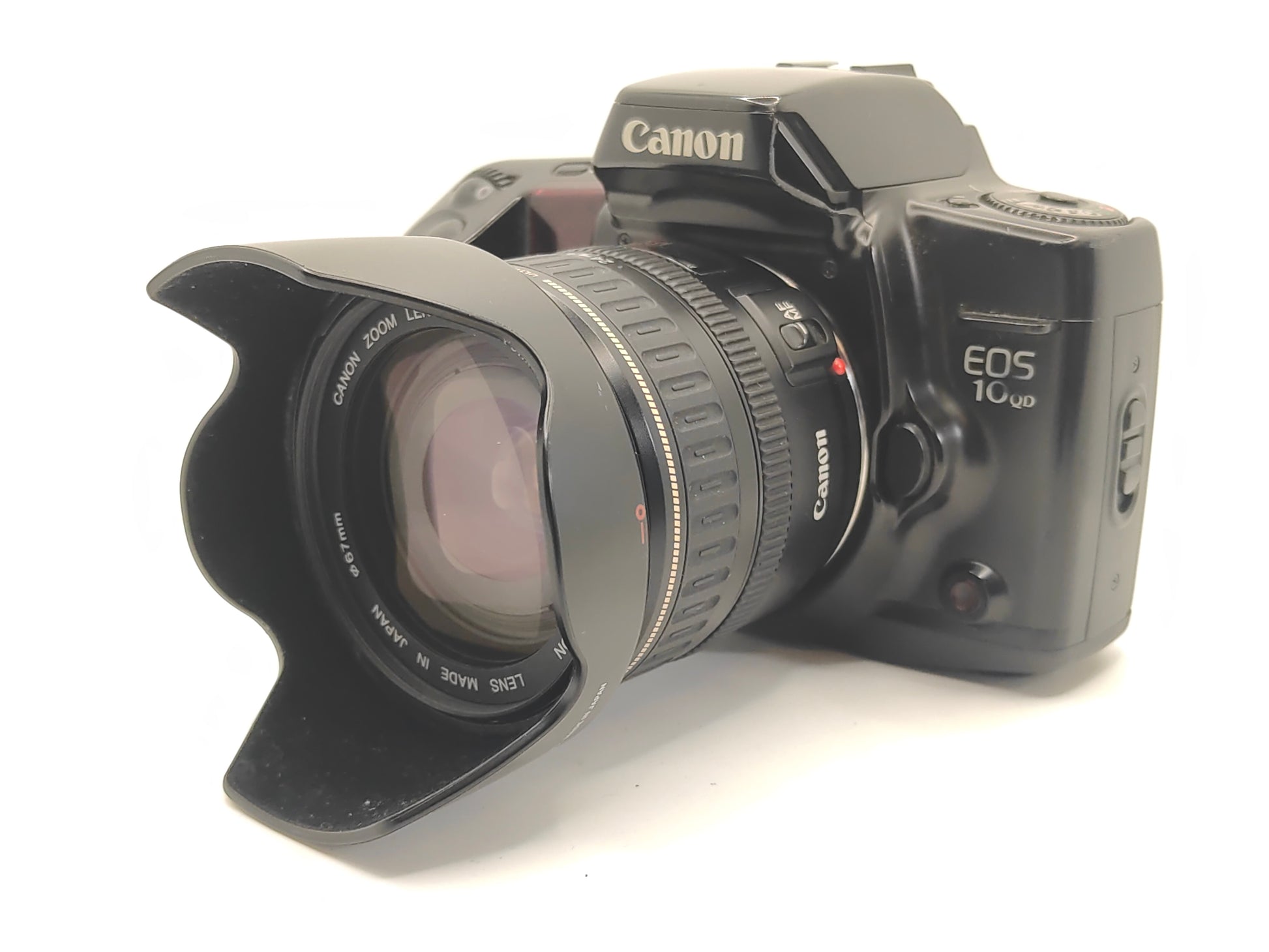 Canon EOS-10 SLR film camera and 24-85mm zoom lens.