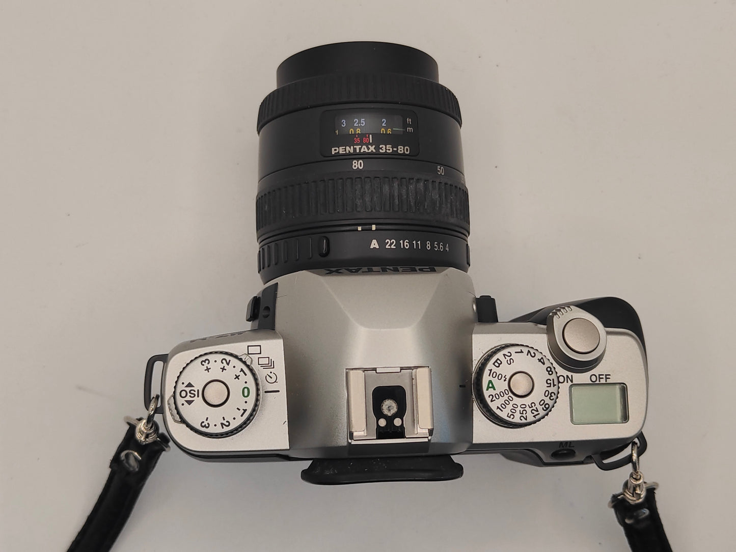 Pentax MZ-M film SLR with 35-80mm zoom lens.