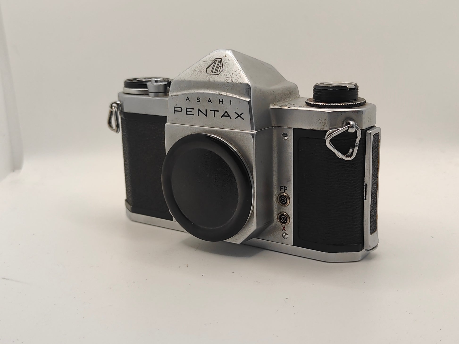 Pentax S1 slr camera with original leather case.