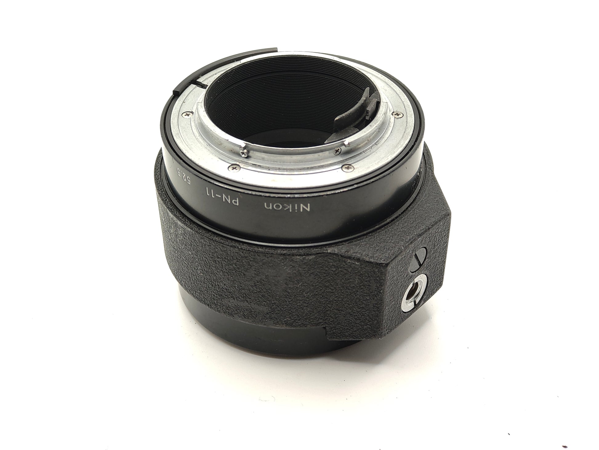 Nikon PN-11 52.5mm Extension Tube (Nikon F mount) with tripod socket.
