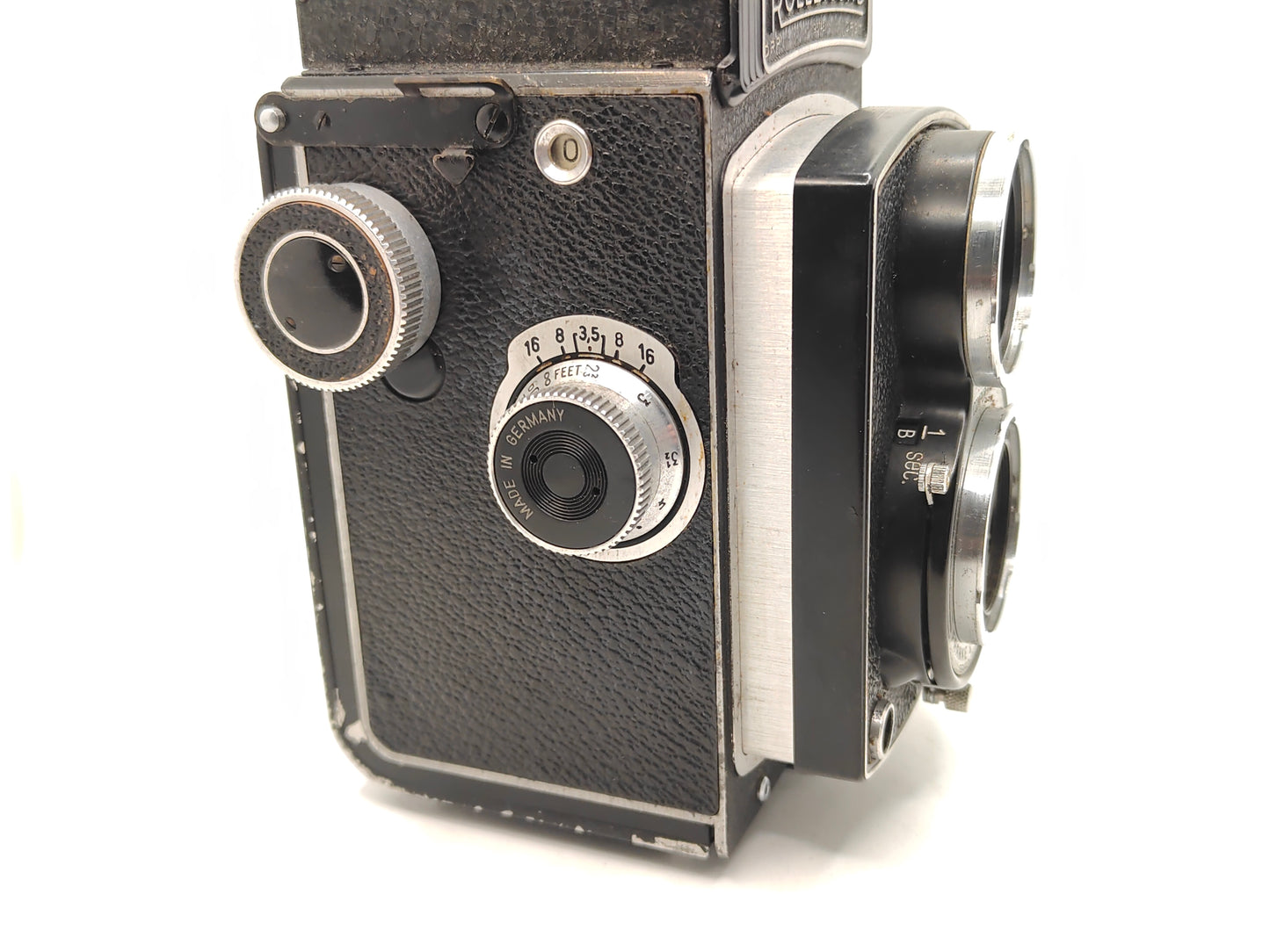 Rolleicord III twin-lens-reflex medium-format camera with leather case.