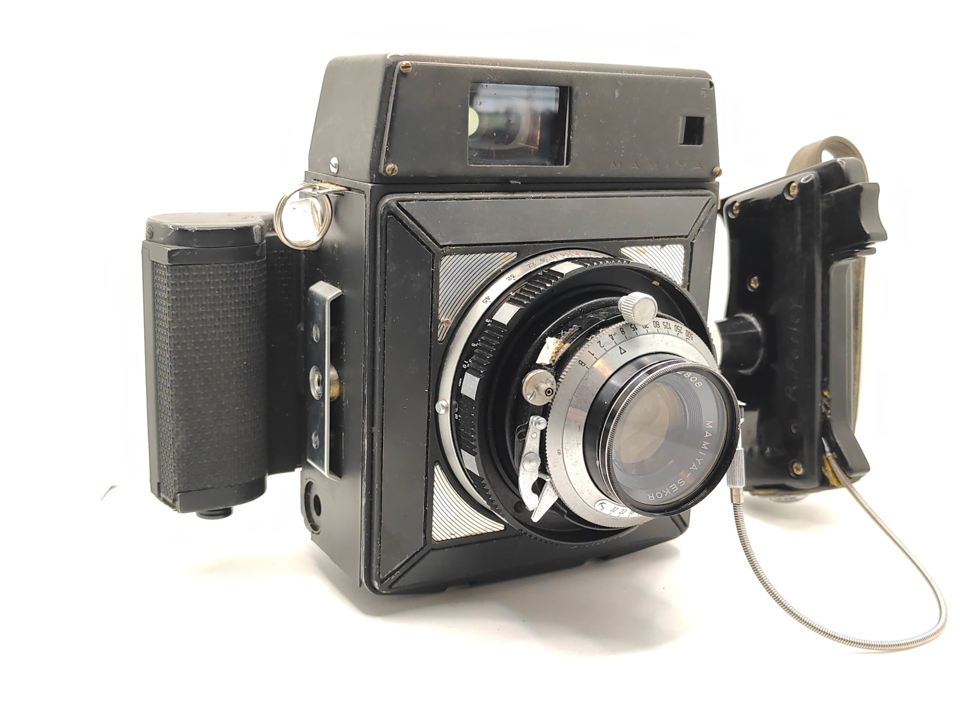 Mamiya Press camera with 90mm f/3.5 lens.