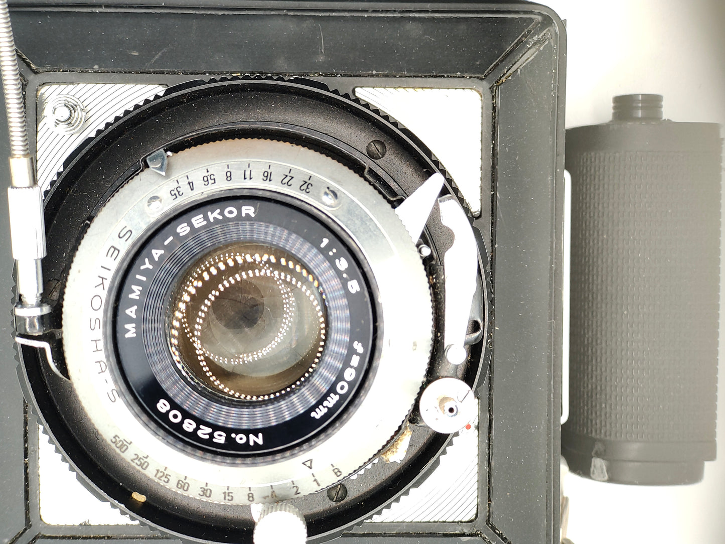 Mamiya Press camera with 90mm f/3.5 lens.
