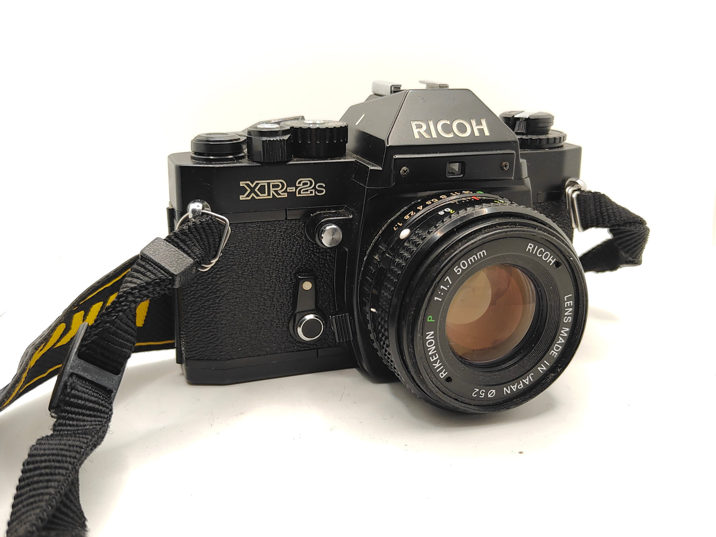 Ricoh XR-2s SLR camera with 50mm lens..
