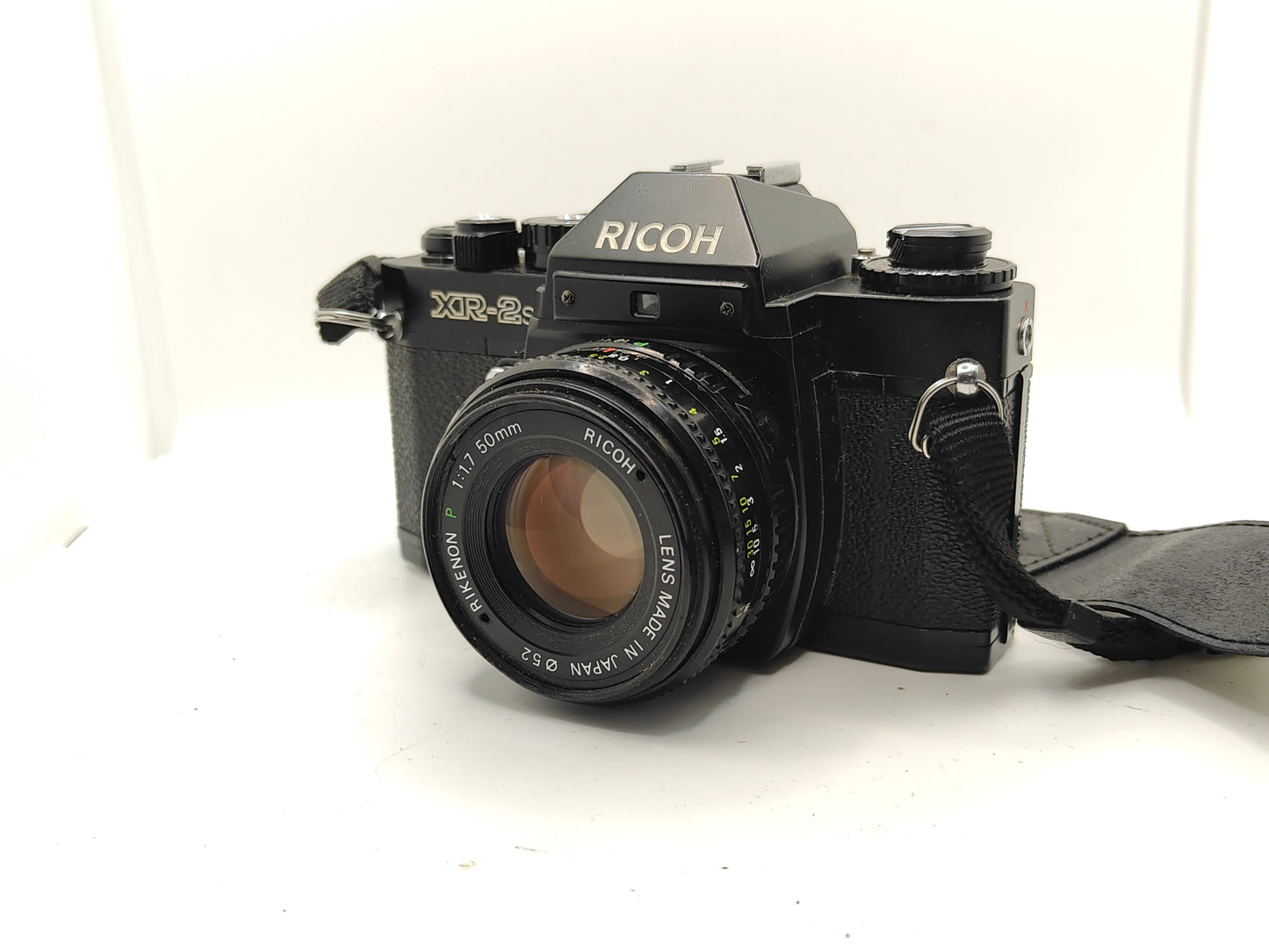 Ricoh XR-2s SLR camera with 50mm lens..