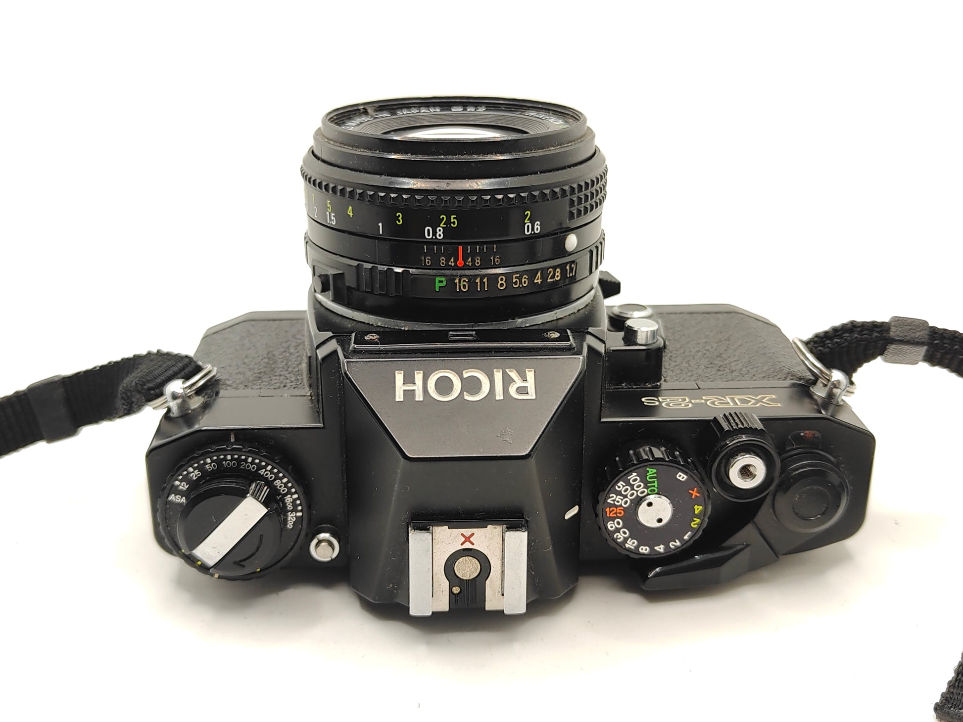 Ricoh XR-2s SLR camera with 50mm lens..