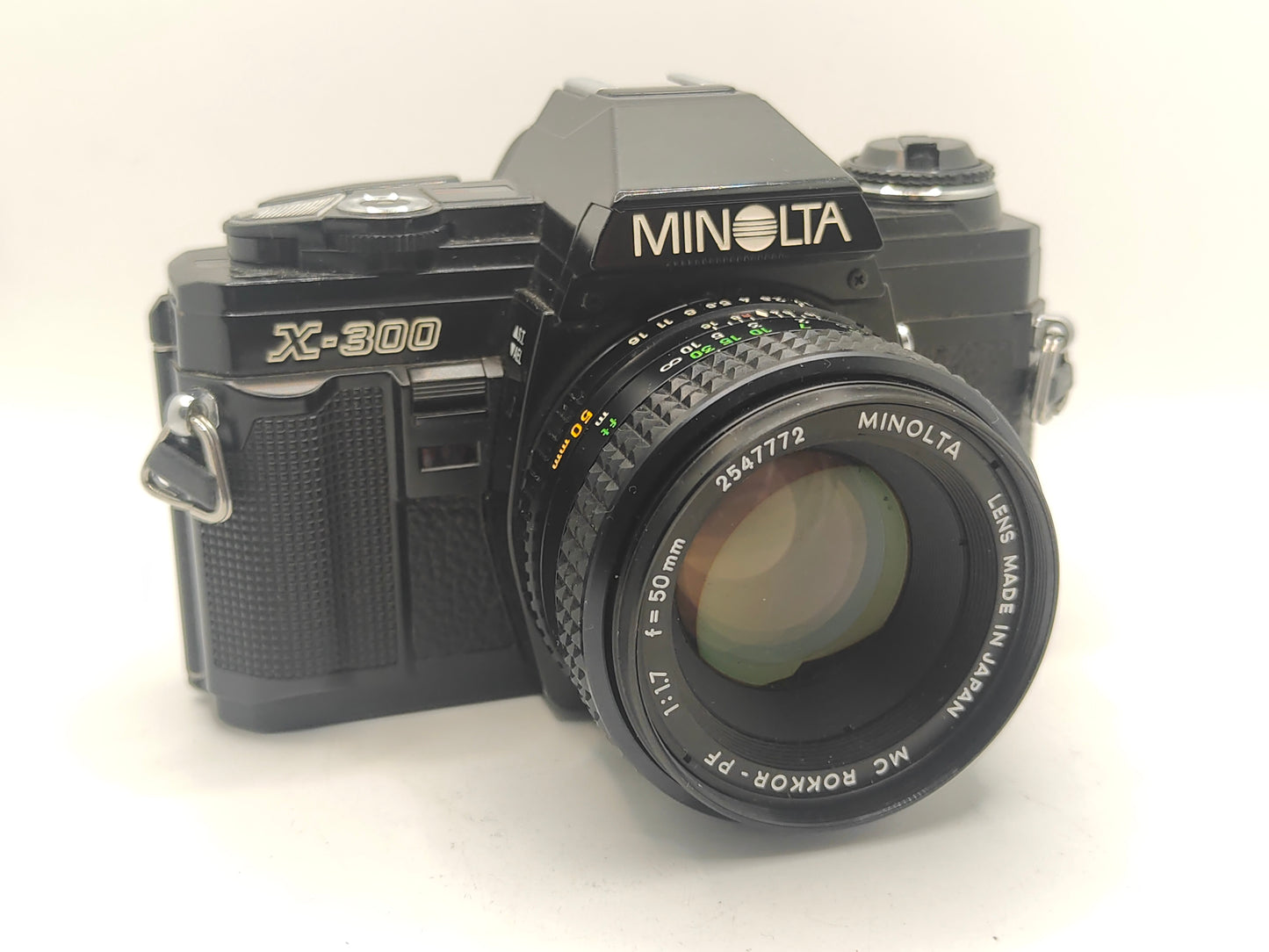Minolta X-300 SLR with 50mm f/1.7 lens.