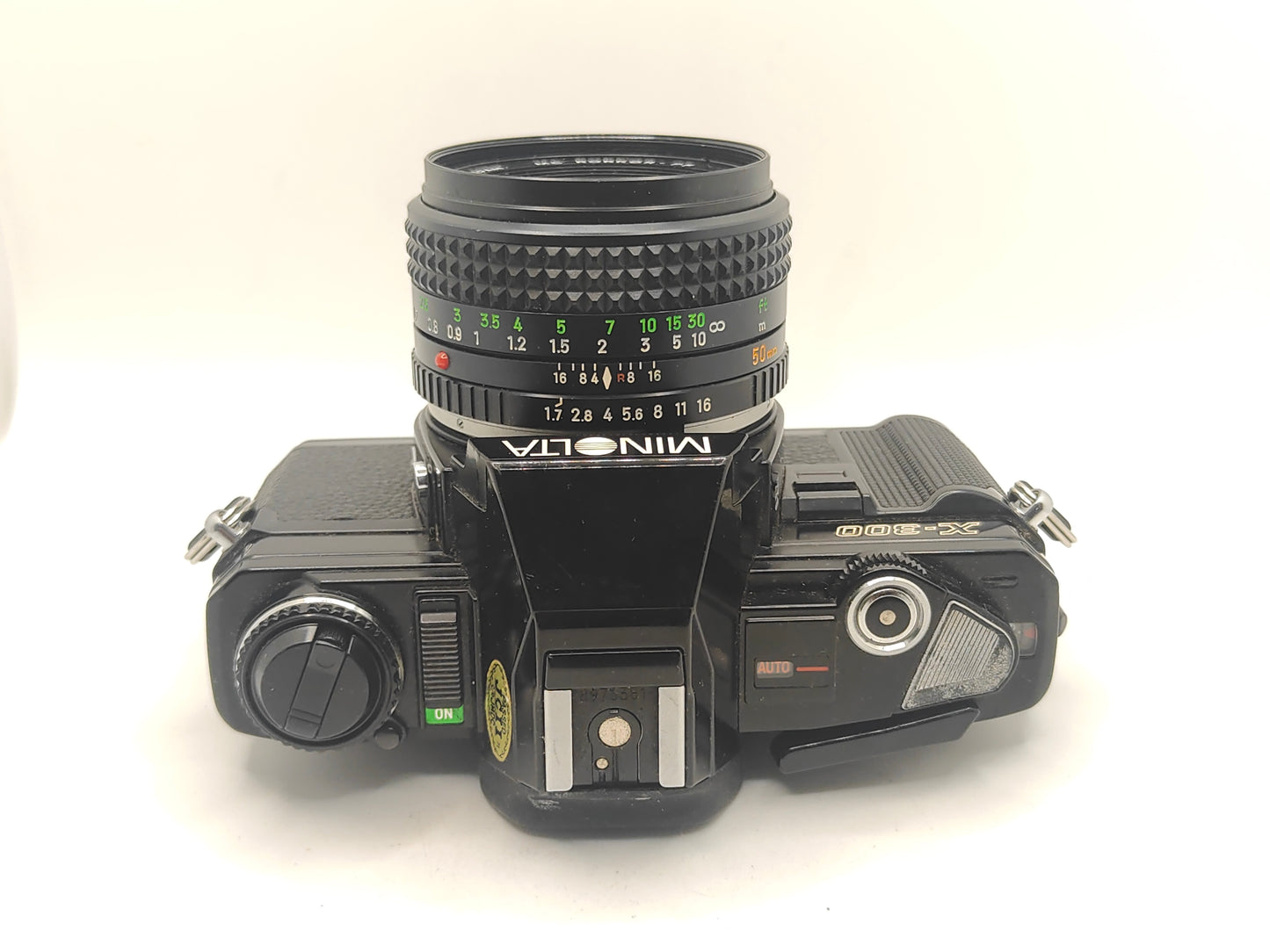 Minolta X-300 SLR with 50mm f/1.7 lens.