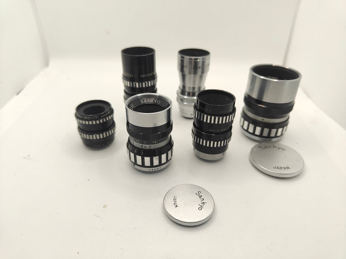 6 D-mount lenses for 8mm cine cameras.