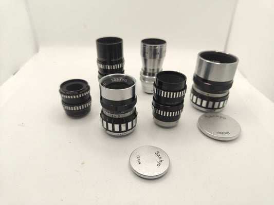 6 D-mount lenses for 8mm cine cameras.